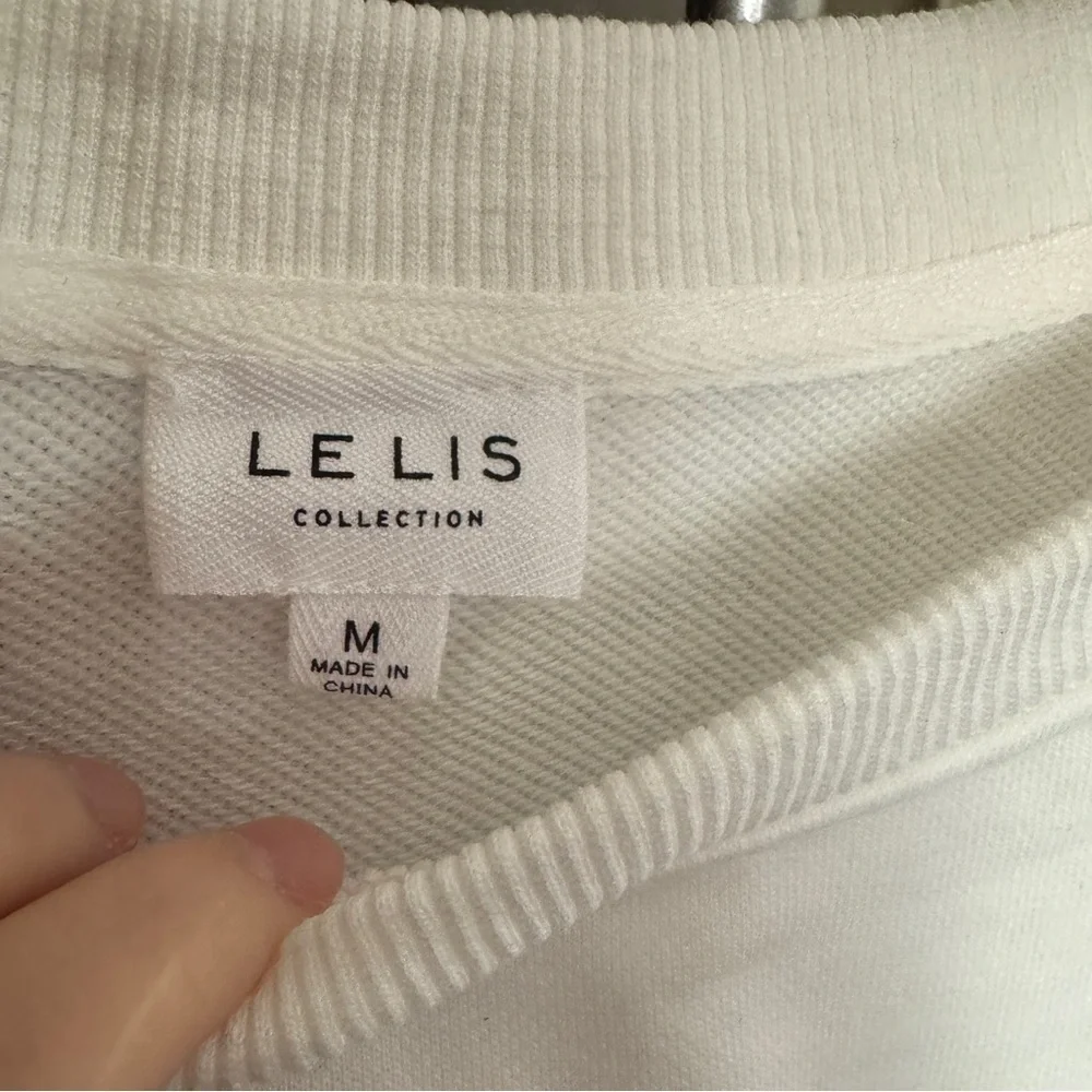 NWOT Le Lis White Football Sequins Sweatshirt Size M